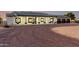 Beautiful home with a long driveway and an attached three car garage at 25450 W Pueblo Ave, Buckeye, AZ 85326