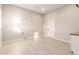 Bright laundry room with hookups, a side counter, and ample space for storage at 25450 W Pueblo Ave, Buckeye, AZ 85326