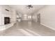 Open living space with a fireplace, tile floors, and lots of natural light at 25450 W Pueblo Ave, Buckeye, AZ 85326