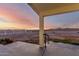 Covered patio with beautiful sunset views provides a relaxing outdoor space at 25450 W Pueblo Ave, Buckeye, AZ 85326