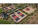 Aerial view of community courts for tennis, basketball, and other sports and activities at 2944 N 98Th Ln, Phoenix, AZ 85037