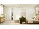 Bright bedroom with stylish furniture, soft lighting, and modern decor at 2944 N 98Th Ln, Phoenix, AZ 85037