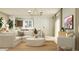 Bright living space featuring comfortable seating and modern fixtures at 2944 N 98Th Ln, Phoenix, AZ 85037