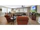 Cozy living room featuring bright windows, a ceiling fan, and an open floor plan at 3359 E Penedes Dr, Gilbert, AZ 85298