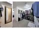 Large walk-in closet featuring built-in shelving and plenty of space for clothes and accessories at 3359 E Penedes Dr, Gilbert, AZ 85298