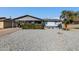Charming single-story home with rock landscaping and a mature citrus tree in the front yard at 3422 W Poinsettia Dr, Phoenix, AZ 85029