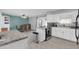 Updated kitchen featuring a dining area, granite countertops and stainless steel appliances at 3422 W Poinsettia Dr, Phoenix, AZ 85029