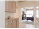 Hallway offers a glimpse into a bright home office space at 345 S Buena Vista Ave, Gilbert, AZ 85296