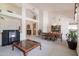 Open-concept space with tiled flooring, a living room, and a dining area, perfect for entertaining at 345 S Buena Vista Ave, Gilbert, AZ 85296