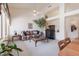 Airy living room filled with natural light, featuring comfortable seating and an open layout for relaxation and entertaining at 345 S Buena Vista Ave, Gilbert, AZ 85296