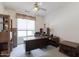 Home office space with desk and shelving at 345 S Buena Vista Ave, Gilbert, AZ 85296