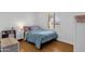 Comfortable bedroom with a window and minimalist decor at 3709 W Grovers Ave, Glendale, AZ 85308