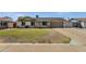 Charming single-story home featuring a well-maintained lawn and an attached two-car garage at 3709 W Grovers Ave, Glendale, AZ 85308