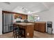 Bright kitchen featuring stainless steel appliances, granite countertops, and ample cabinet space at 3709 W Grovers Ave, Glendale, AZ 85308