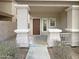 Charming front porch with decorative columns and a welcoming entryway at 4005 W Carter Rd, Phoenix, AZ 85041
