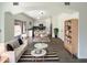 Open-concept living space with kitchen, dining, and living area featuring stylish decor and ample natural light at 4005 W Carter Rd, Phoenix, AZ 85041
