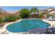 Inviting backyard pool with lush landscaping, perfect for relaxation and outdoor enjoyment at 44810 W Horse Mesa Rd, Maricopa, AZ 85139