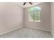 Bright bedroom featuring a large window with natural light and carpet flooring at 4653 W Dublin St, Chandler, AZ 85226