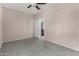 Spacious bedroom featuring neutral tones, carpet flooring, and a doorway to another room at 4653 W Dublin St, Chandler, AZ 85226