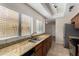 Bright kitchen featuring granite countertops and stainless steel appliances at 4653 W Dublin St, Chandler, AZ 85226