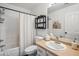 Cozy bathroom with updated fixtures, and convenient access to the bathtub and shower at 4728 N 92Nd Ave, Phoenix, AZ 85037