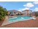 Backyard pool featuring a basketball hoop and ample space for lounging at 4728 N 92Nd Ave, Phoenix, AZ 85037