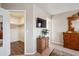Walk-in closet providing ample storage space and conveniently located off the main bedroom at 4728 N 92Nd Ave, Phoenix, AZ 85037