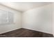 Inviting bedroom with hardwood floors and a window for natural light to fill the room at 4743 N 26Th Ln, Phoenix, AZ 85017