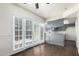 Open-concept dining area with bright lighting and direct access to the outdoor patio at 4743 N 26Th Ln, Phoenix, AZ 85017