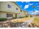 Inviting exterior view showcasing the townhome's landscape and curb appeal under a clear sky at 4743 N 26Th Ln, Phoenix, AZ 85017