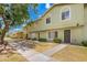Attractive townhome complex featuring tidy landscaping and a pedestrian-friendly walkway at 4743 N 26Th Ln, Phoenix, AZ 85017