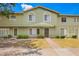 Charming townhome with a well-maintained lawn and classic architectural details at 4743 N 26Th Ln, Phoenix, AZ 85017