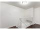 Upper hallway featuring the staircase, hardwood floors, and railing at 4743 N 26Th Ln, Phoenix, AZ 85017