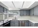 Contemporary kitchen with updated countertops, stainless appliances, and ample cabinet space at 4743 N 26Th Ln, Phoenix, AZ 85017