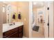 Bathroom featuring a single vanity, dark wood cabinetry, and tile flooring at 4836 S Covalent Ln, Mesa, AZ 85212