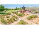 Beautiful community park featuring a gazebo, flowers, and green space at 4836 S Covalent Ln, Mesa, AZ 85212