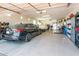 Spacious garage featuring ample storage, with room for multiple vehicles and projects at 4836 S Covalent Ln, Mesa, AZ 85212
