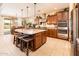 Well-appointed kitchen with an oversized island, perfect for entertaining and culinary creations at 4836 S Covalent Ln, Mesa, AZ 85212