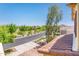 Street view showcasing a landscaped street, neighborhood park, and beautiful community at 4836 S Covalent Ln, Mesa, AZ 85212