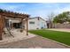 Well-maintained backyard with artificial turf, pergola, and cozy seating, creating a perfect outdoor retreat at 5025 N 20Th Ave, Phoenix, AZ 85015