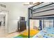 This bedroom features a bunk bed, carpet, and lots of natural light at 5025 N 20Th Ave, Phoenix, AZ 85015