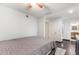 This bedroom features wood-look floors, neutral walls and ensuite bathroom at 5025 N 20Th Ave, Phoenix, AZ 85015