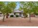 Charming home featuring a well-maintained front yard with mature trees at 5025 N 20Th Ave, Phoenix, AZ 85015