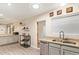 Bright kitchen featuring modern appliances, granite countertops, and ample storage at 5025 N 20Th Ave, Phoenix, AZ 85015