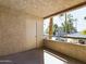 Cozy balcony offering a relaxing retreat with a view of mature trees and landscaping at 5124 N 31St Pl # 522, Phoenix, AZ 85016