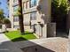 Image of a tan building with grass, sidewalk, a large tree and exterior architectural details at 5124 N 31St Pl # 522, Phoenix, AZ 85016