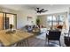 Inviting living room with wood floors, fan, neutral decor, and a bright, open layout at 5124 N 31St Pl # 522, Phoenix, AZ 85016