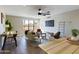 Bright living space featuring neutral colors, wood floors, modern furnishings, and a large window at 5124 N 31St Pl # 522, Phoenix, AZ 85016