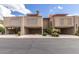 Modern townhome featuring covered parking, desert landscaping and a neutral color scheme at 5621 N 79Th St, Scottsdale, AZ 85250