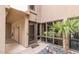 Charming front entrance with a palm tree and gravel surrounding the landscaping at 5621 N 79Th St, Scottsdale, AZ 85250